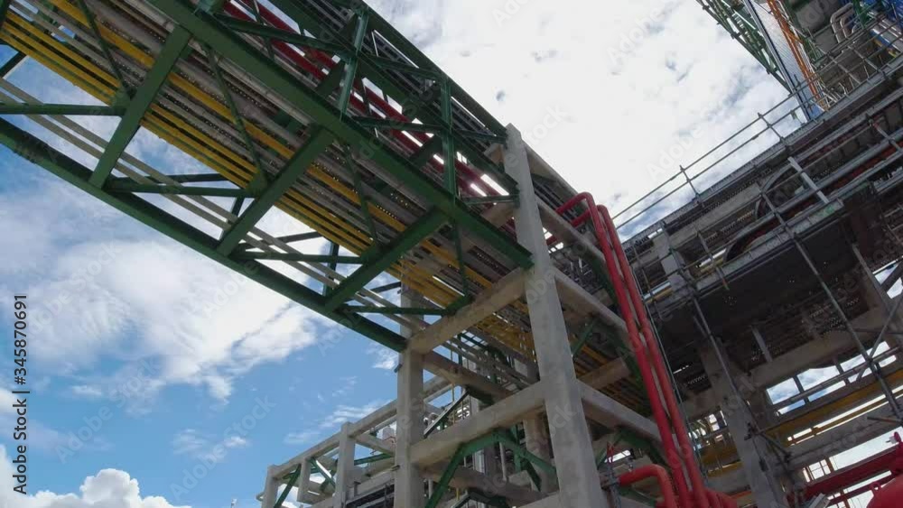Petroleum plant with blue sky. Panning Video Petroleum plant with blue sky. Panning Video