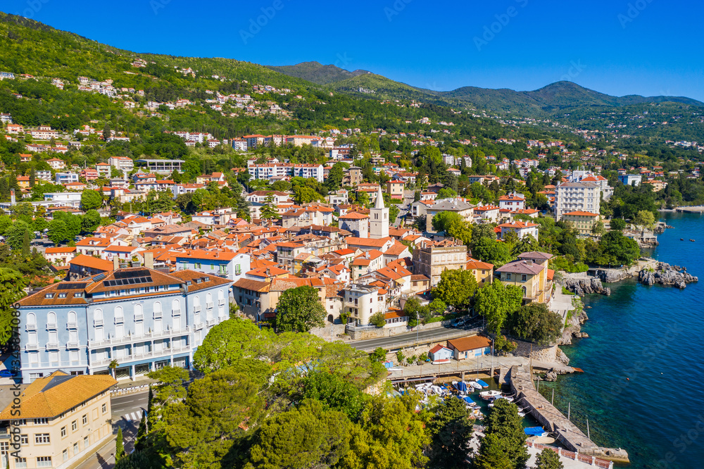 Croatia, beautiful town of Lovran and Lungomare sea walkway, aerial panoramic view in Kvarner bay coastline
