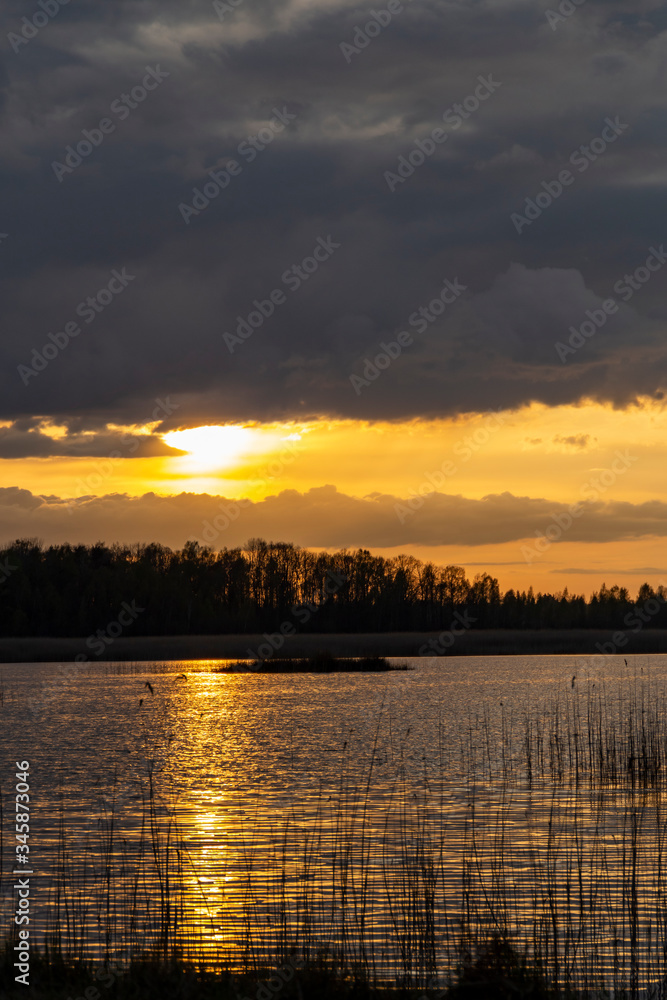 Sunset over Lake Kanieris in the spring evening.
