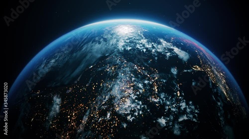 Planet Earth shot from the Universe where North Pole can be seen surrounded by electrical yellow and golden lights and clouds floating in the air. 