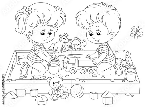 Happy small children friendly smiling, romping and playing with their funny toys in a sandbox on a playground in a summer park, black and white vector cartoon illustration for a coloring book page