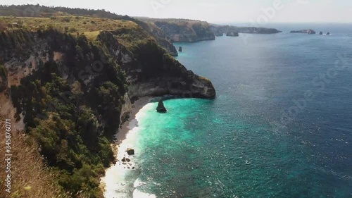 A drone flies on a paradise beach photo