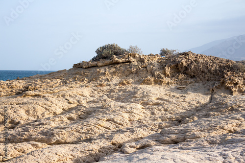 Oman beach with sea and amazing rocks, SUR Fence Beach