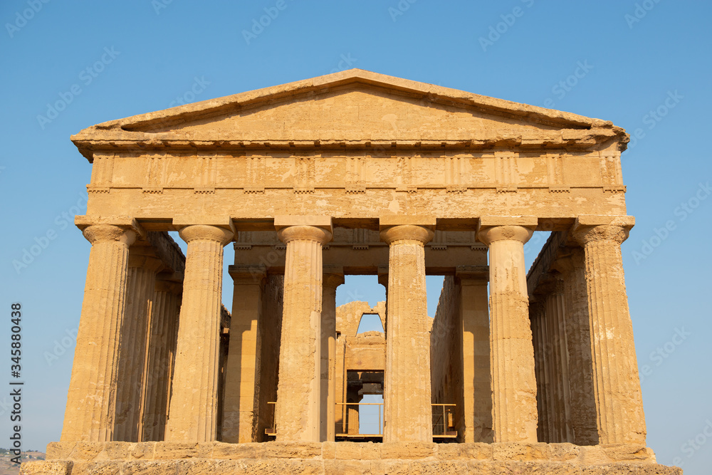 Valley of the Temples (Valle dei Templi), an ancient Greek Temple built in the 5th century BC, Agrigento, Sicily. Famous tourist attraction in Italy. Old marble columns of the Doric order