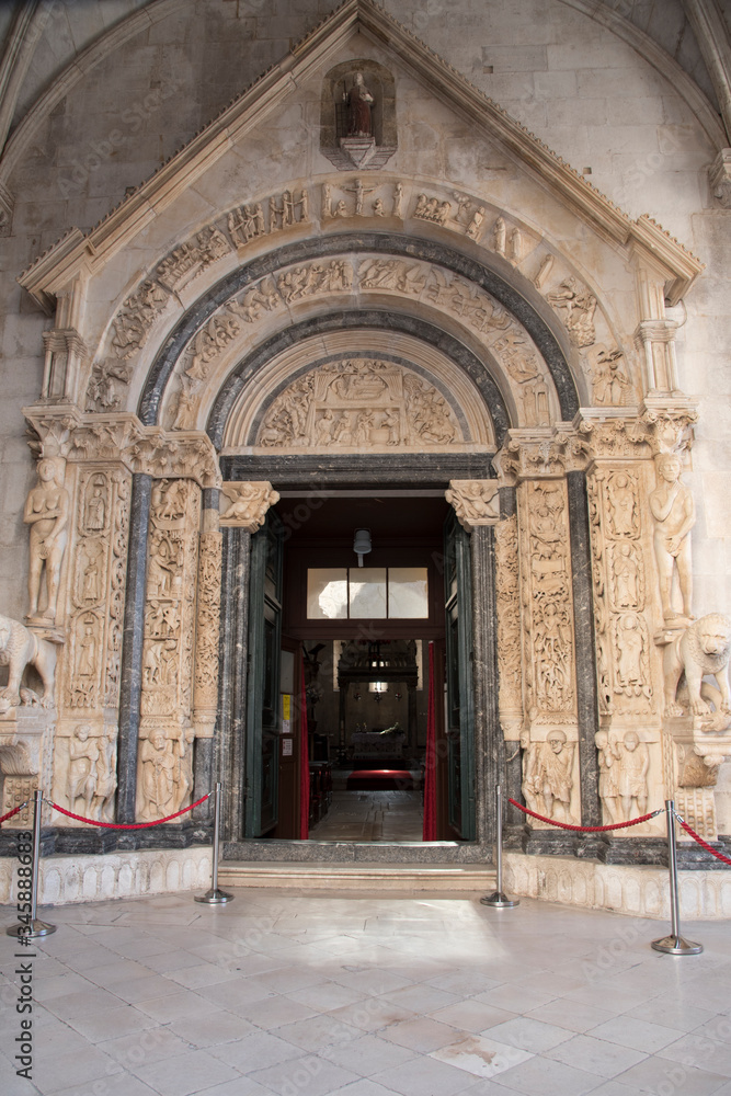Cathedral gate, in Trogir, port and historical city on the Adriatic sea coast, Split-Dalmatia region, Croatia, Europe.