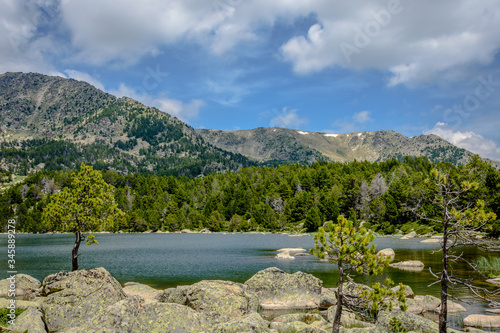 Landscape in the mountains with a beautiful lake (Malniu Lake, Catalonia, Spain).