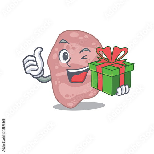 Smiling verrucomicrobia cartoon character having a green gift box