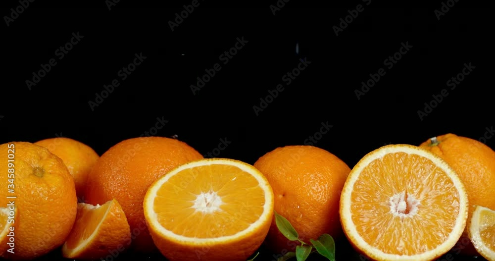 On juicy oranges falling water drops. On juicy oranges falling water drops.