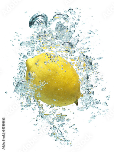 lemon is dropped into water
