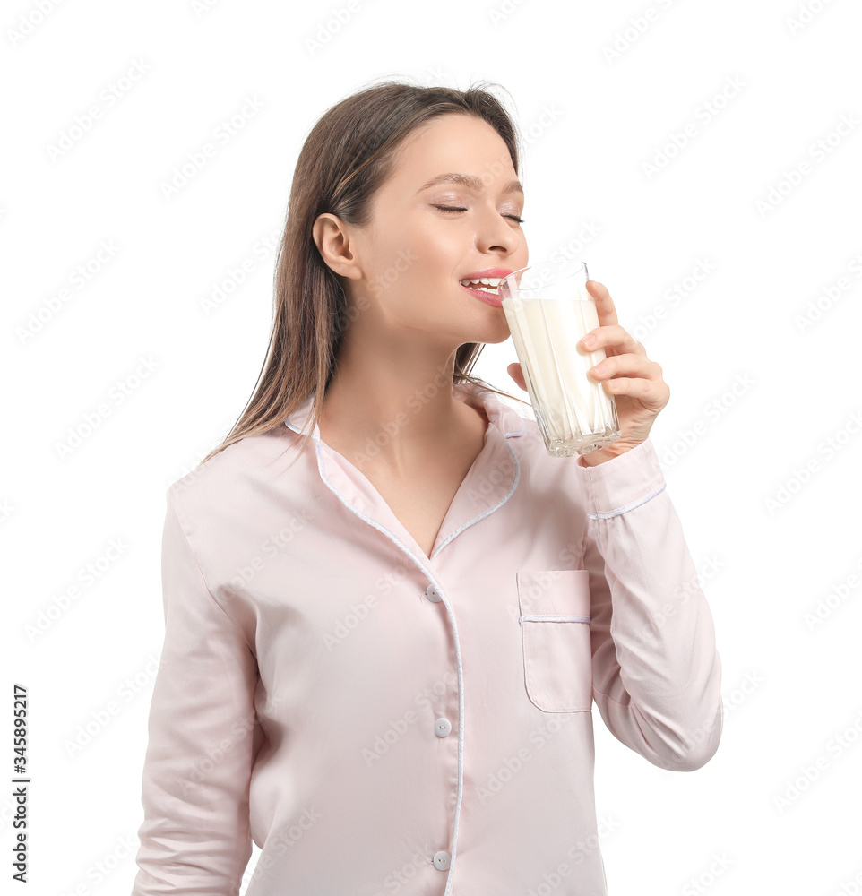 Young woman with glass of milk on white background Young woman with glass of milk on white background