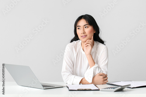 Beautiful Asian secretary a...