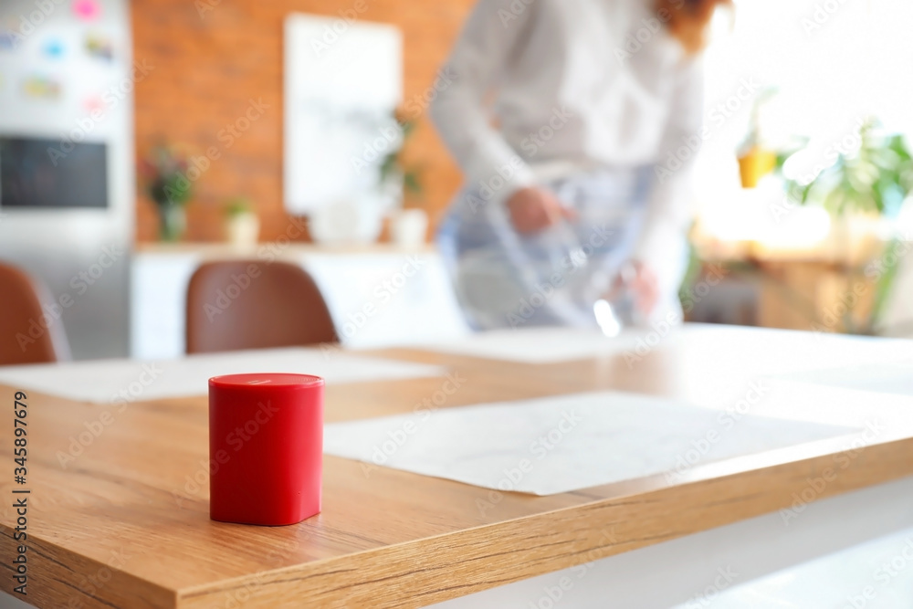 Smart home assistant device on table in kitchen