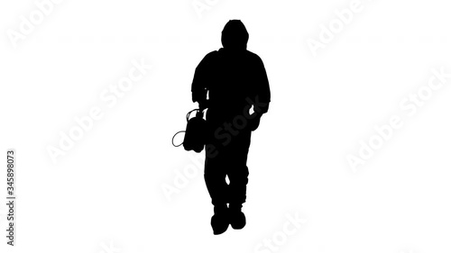 Silhouette Disinfectant walking with antiviral liquid tank looking to camera. photo