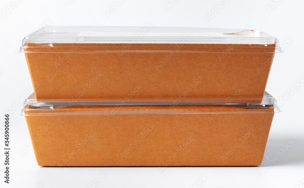 Cardboard brown food box pack isolated on white background close up Cardboard brown food box pack isolated on white background close up