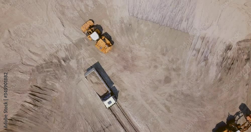 The work of loading equipment in the sand quarry The work of loading equipment in the sand quarry