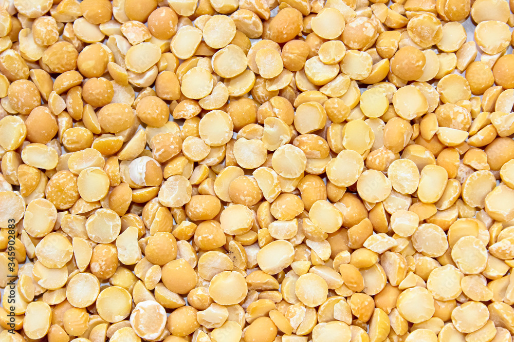 Layer of dry yellow peas. Food background of legumes. Layer of dry yellow peas. Food background of legumes.