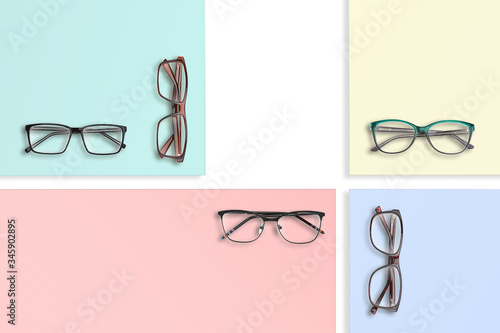 Composition of many different classic style glasses on square stands of different colors.