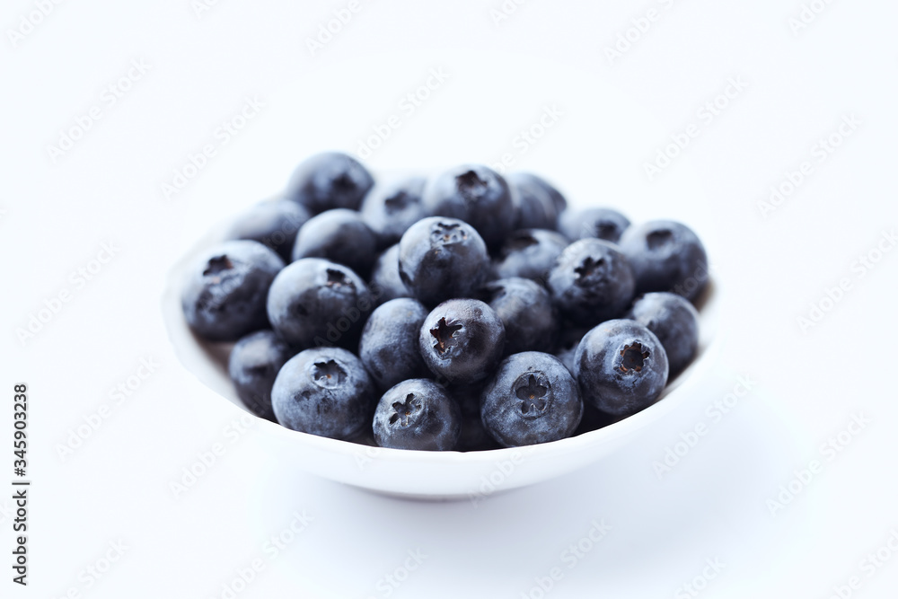 Bilberries isolated on white background. Concept for healthy nutrition. Bilberries isolated on white background. Concept for healthy nutrition.