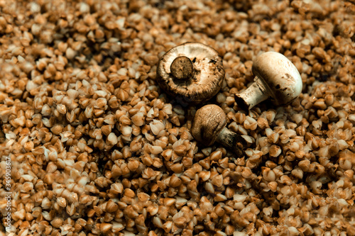 Buckwheat porridge with mushrooms. Selective focus.