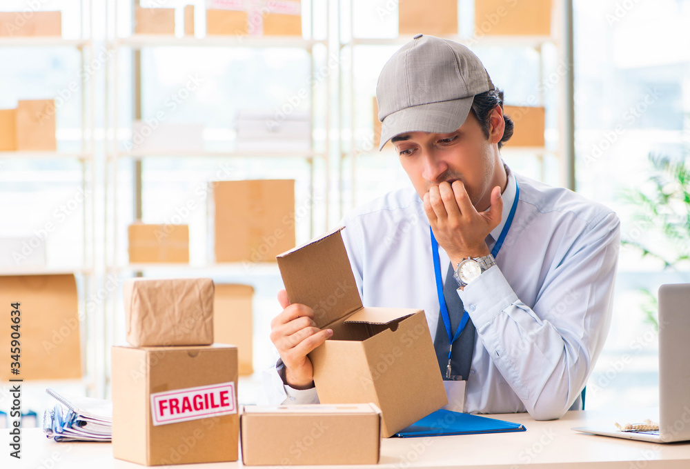 Male employee working in box delivery relocation service Male employee working in box delivery relocation service