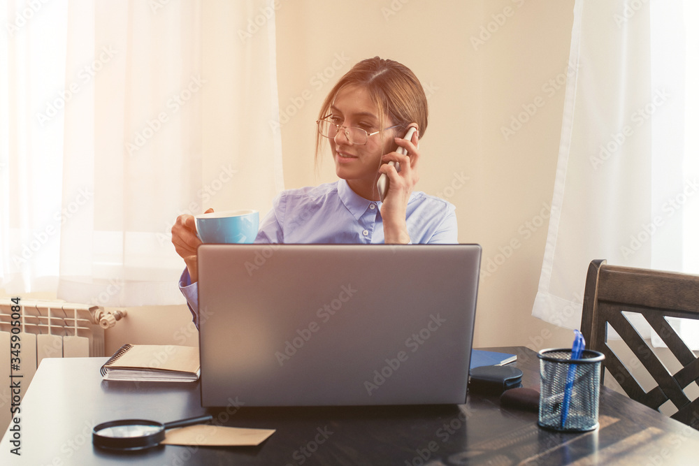 woman working on laptop. Woman phone. Laptop. Business concept. happy day. Stay home. woman working on laptop. Woman phone. Laptop. Business concept. happy day. Stay home.