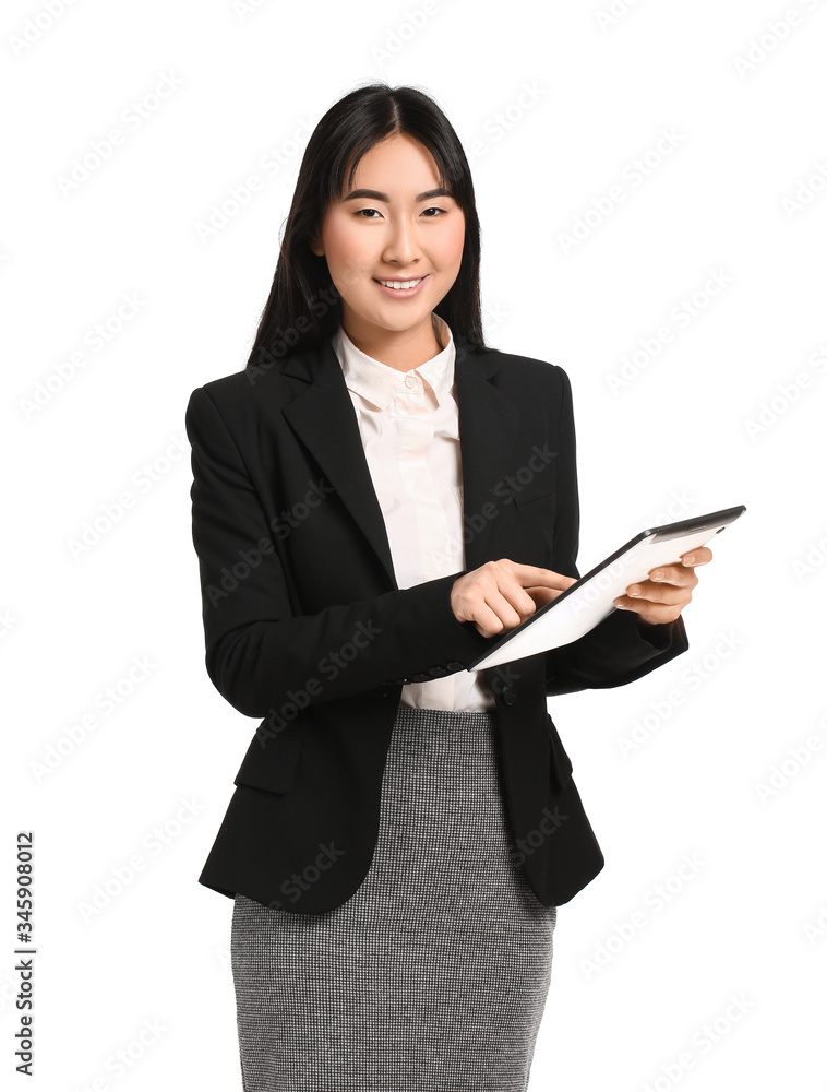 Beautiful Asian secretary with tablet computer on white background Beautiful Asian secretary with tablet computer on white background