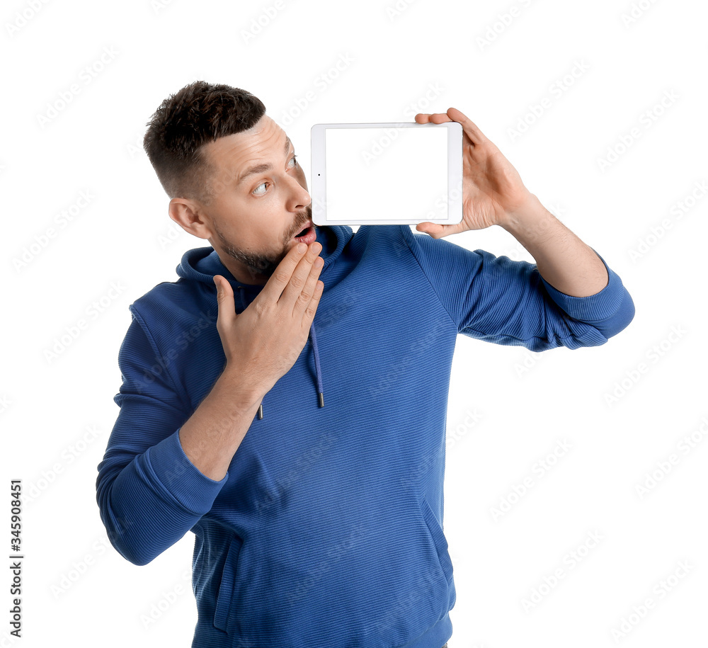Surprised man with tablet computer on white background Surprised man with tablet computer on white background