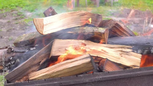 wood burning in the grill close up