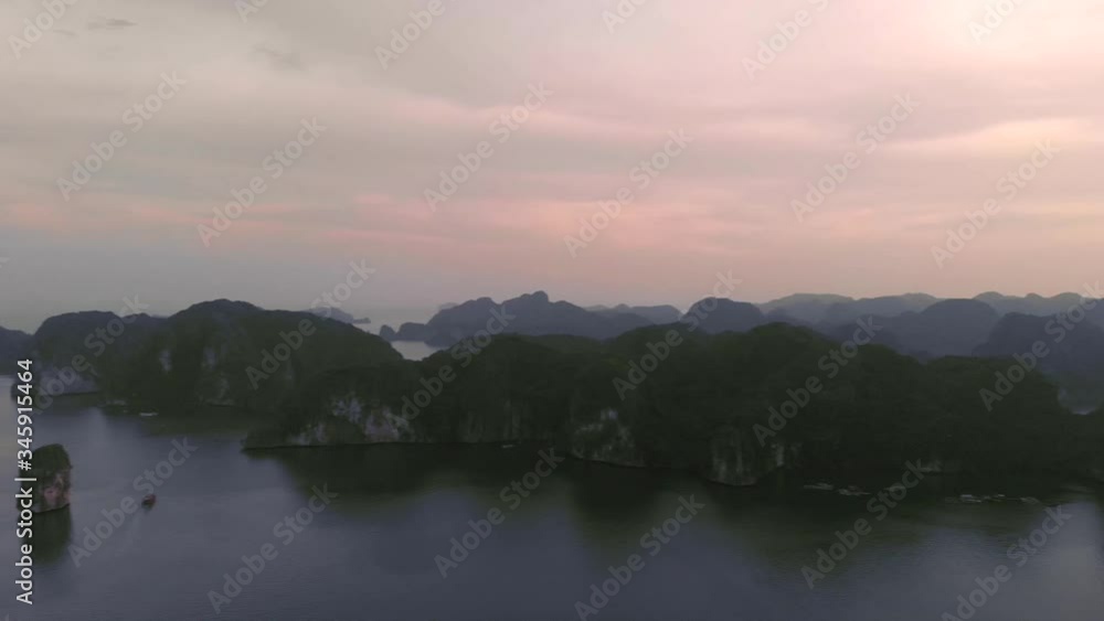 Pan left of Halong Bay with cruiseship cruising Pan left of Halong Bay with cruiseship cruising