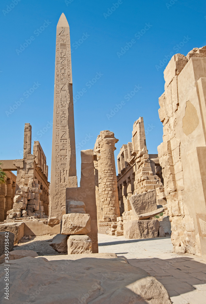 Obelisk with hieroglyphics and ancient egyptian Karnak Temple