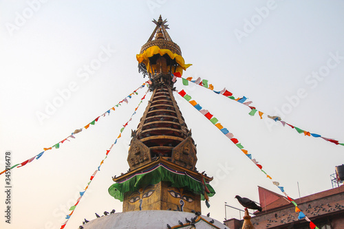View of Eye of Buddha on buddhist Kathesimbhu stupa (also known as Kaathe Swyambhu Shree Gha Chaitya) in Thamel district in Kathmandu city. Theme of beautiful religious buildings.