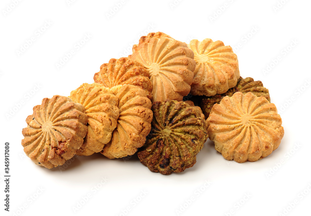 Cookies made of whole grain cereals on a white background Cookies made of whole grain cereals on a white background