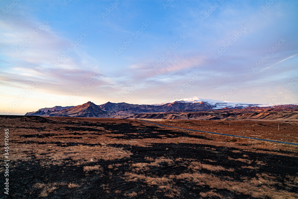 Fototapeta premium Beautiful mountains with dramatic sky along the ring road. Route 1 in Iceland