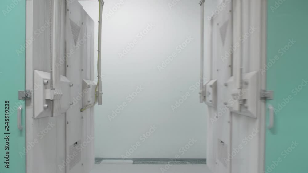Two Vibration Tanks Moving Next To Each Other In Factory. Locked Off Two Vibration Tanks Moving Next To Each Other In Factory. Locked Off