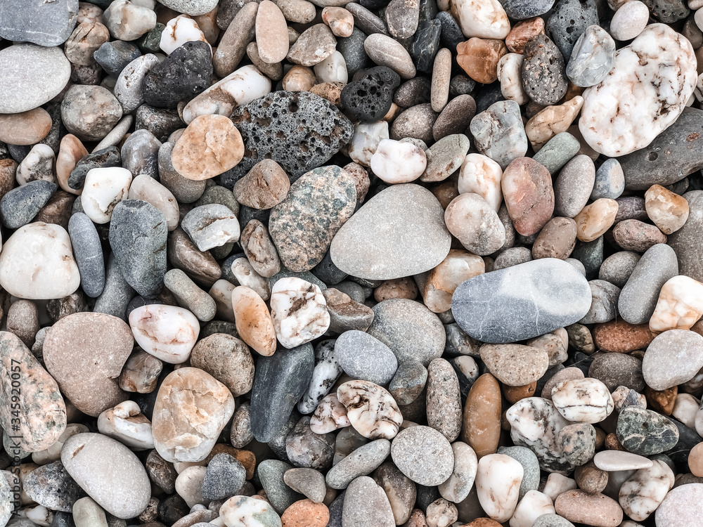 Pebbles on the Mediterranean coast. Natural background for your projects. Travel concept. Pebbles on the Mediterranean coast. Natural background for your projects. Travel concept.