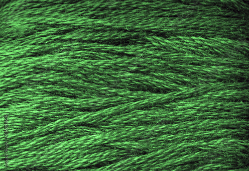 Green threads background, horizontal threads, closeup