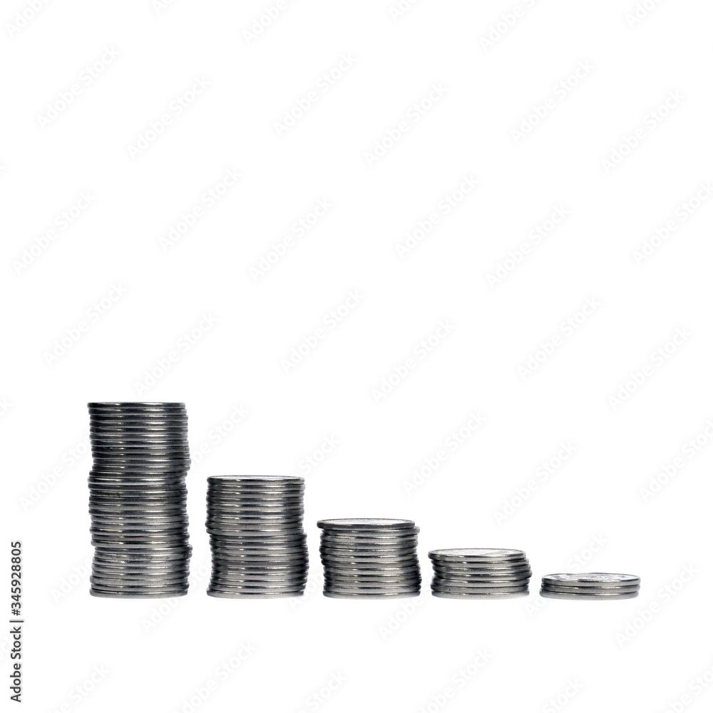 Piles of steel coins on a white background, closeup Piles of steel coins on a white background, closeup