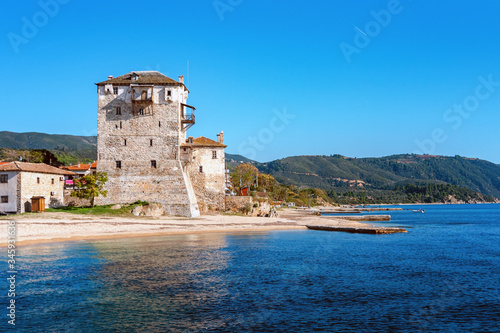 Historic fort in port and city Ouranoupolis , entry site to monasteries of Mount Athos, Chalkidiki, Greece photo