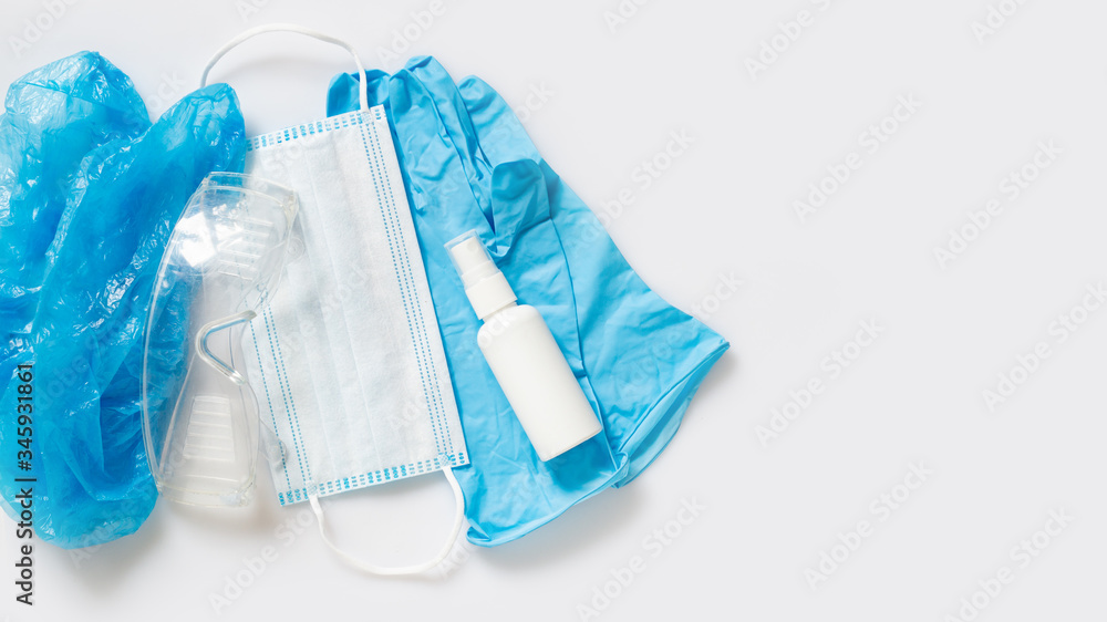 Hat, safety glasses, gloves, mask and sanitizer. Antivirus prevention and protection Hat, safety glasses, gloves, mask and sanitizer. Antivirus prevention and protection
