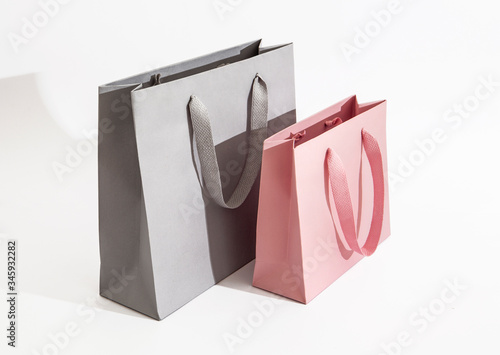 two shopping bags grey pink photo