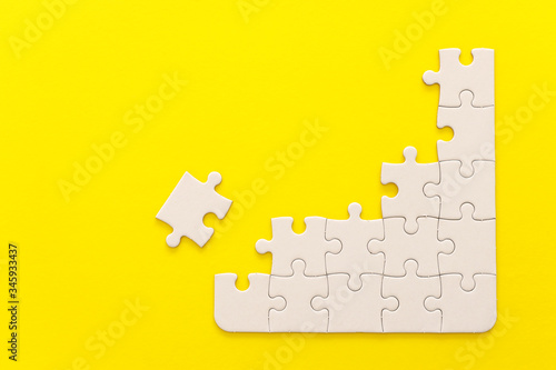 background of white puzzle with missing piece