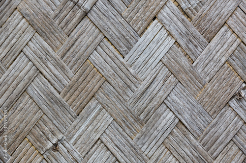 Photo of wood wicker veneer wood close up.