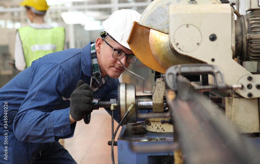 Factory Engineer Operating Hydraulic Tube Bender or cut for quality goods Factory Engineer Operating Hydraulic Tube Bender or cut for quality goods