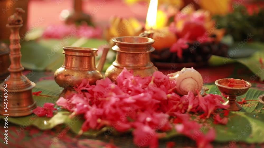 Traditional south Indian brass oil lamp 'Nilavilakku '. During events like housewarming, marriage etc., the Nilavilakku is lighted before starting the rituals. This video is taken during a wedding Traditional south Indian brass oil lamp 'Nilavilakku '. During events like housewarming, marriage etc., the Nilavilakku is lighted before starting the rituals. This video is taken during a wedding