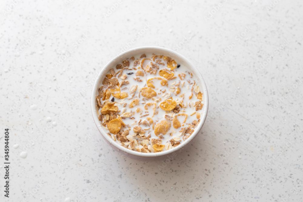 a plate of cornflakes and milk a plate of cornflakes and milk
