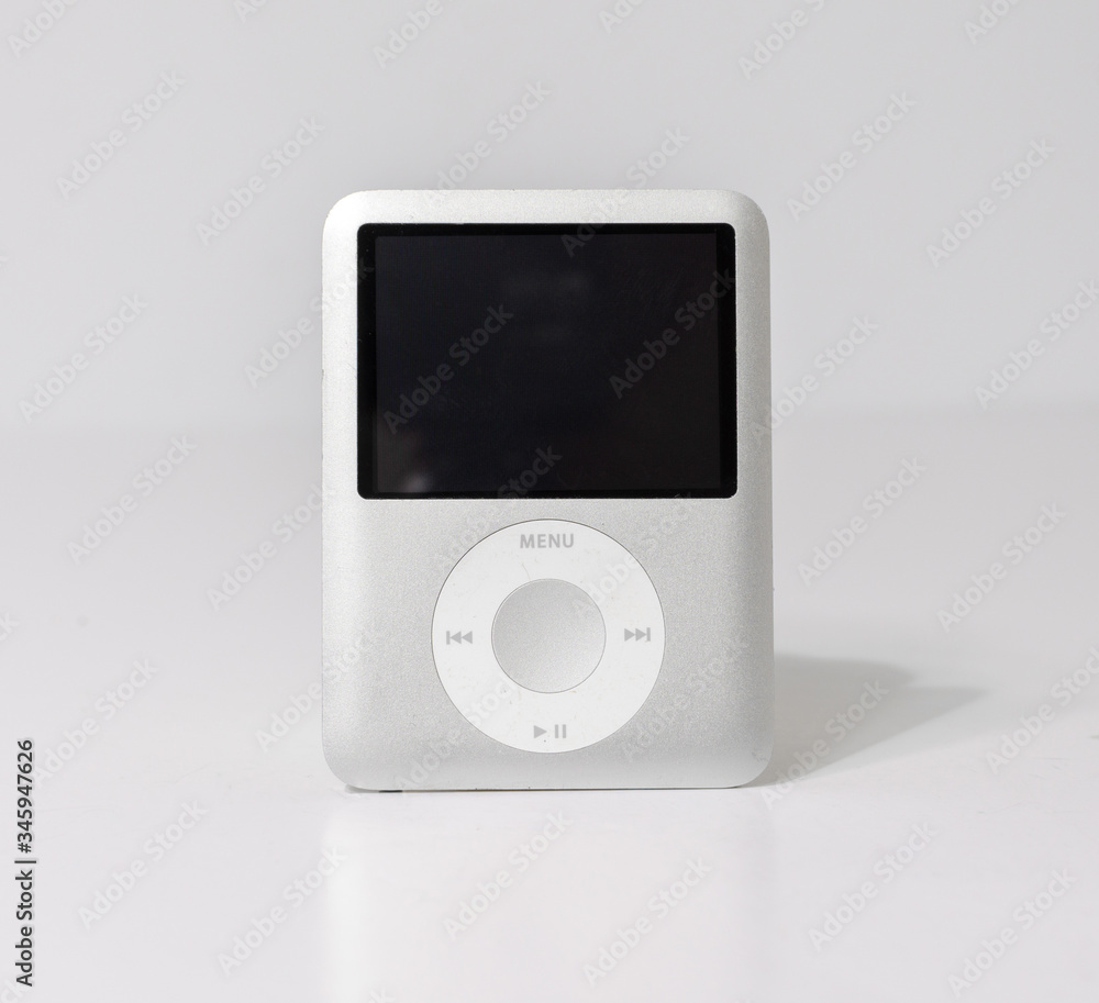 lonodn, engand, 05/04/2020 An retro vintage Apple iPod nano, 3rd 8GB USB MP3 Player, apple technology from 2007 isolated on a white background. Stock Photo | Adobe Stock