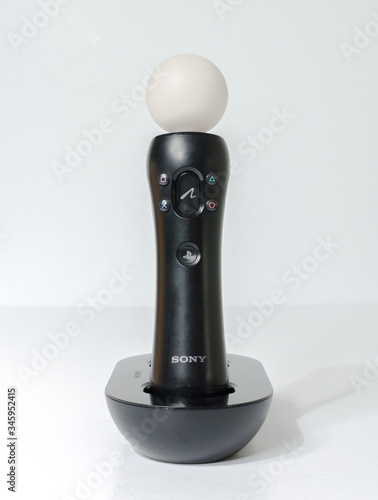 london, england, 05/04/2020 A Sony PS3/PS4 Original Sony PLAYSTATION Move  Controller with charge dock. Enhancing PlayStation virtual reality  experience. hand held action remote. Stock Photo | Adobe Stock