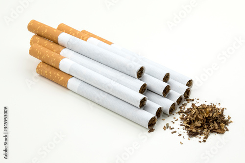 Close up of a smoking cigarettes on white