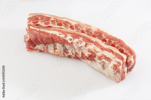 Pork belly isolated on white background. Top view. fresh ribs isolated on white background. With clipping path. Raw meat, farm and cooking concept. Meat shop.