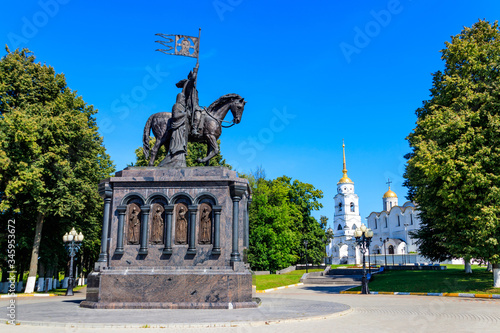 Monument to founder of Vladimir city Prince Vladimir the Red Sun and sanctifier Feodor on the viewing platform with views of Assumption Cathedral in Vladimir, Russia